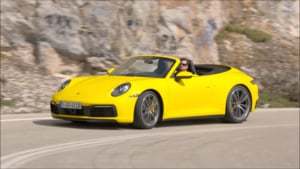 Overview: 2020 Porsche 911 Carrera 4S Cabrio (Racing Yellow)